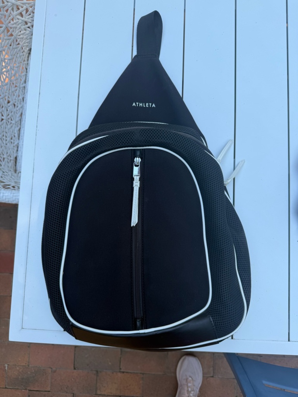 Athleta Black Sling Bag with White Piping